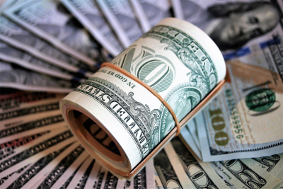 dollars in an elastic band